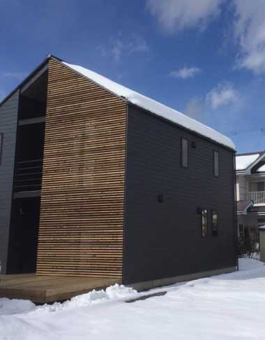 House front covered in snow.